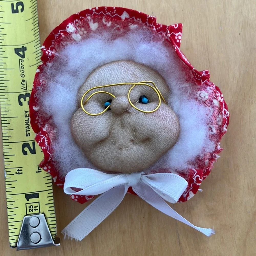 Vintage Mrs. Claus Face Ornament with Gold Glasses and blue eyes, red bonnet